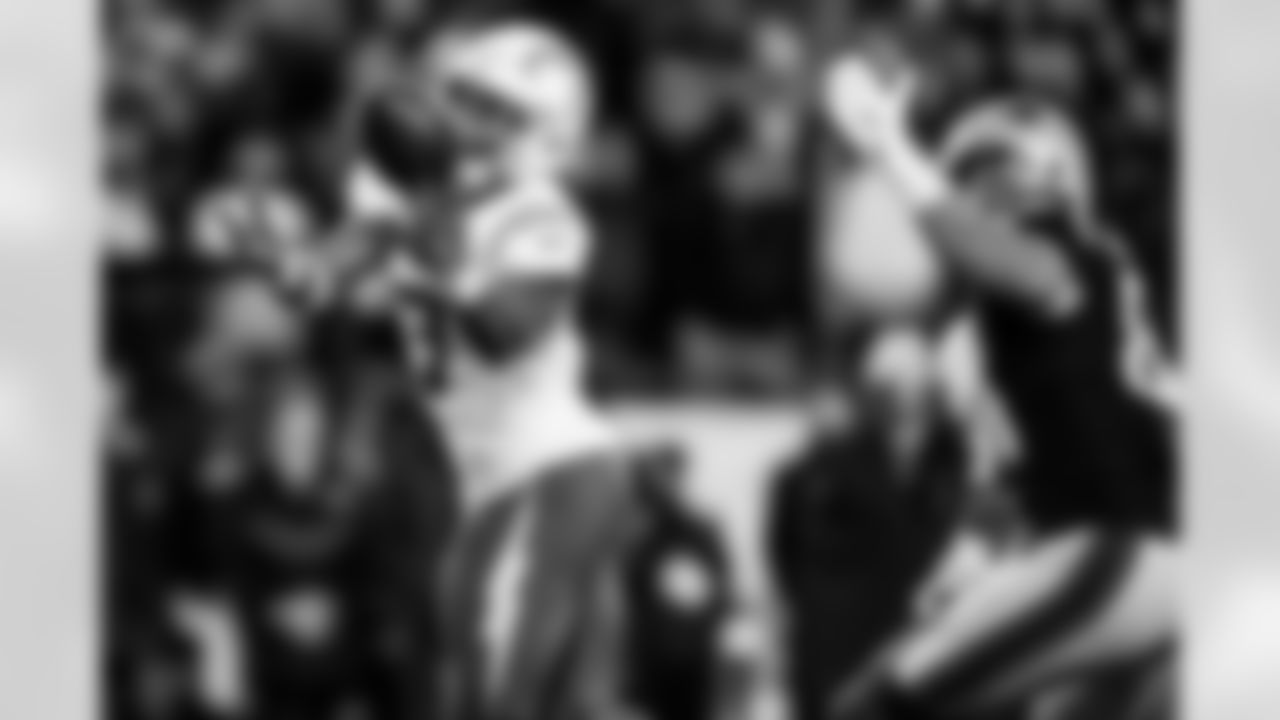 Check out the best shots from the Chargers Wild Card matchup against the Patriots!