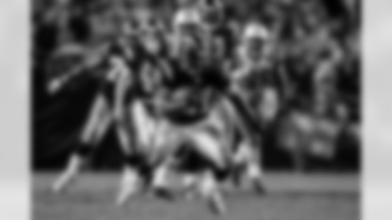 Relive the Chargers' postseason appearances through images from playoff games, highlighting the moments that defined the team in the NFL playoffs.