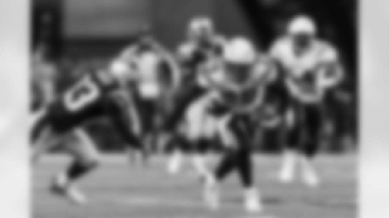 Relive the Chargers' postseason appearances through images from playoff games, highlighting the moments that defined the team in the NFL playoffs.