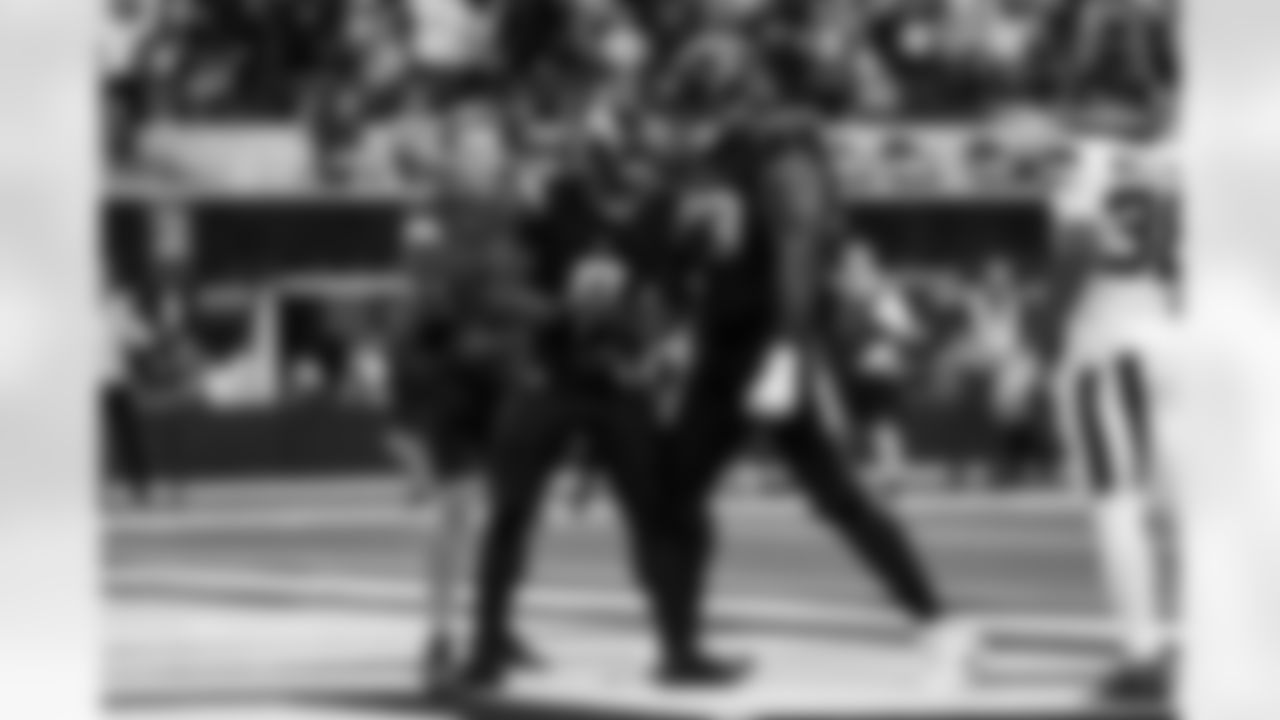 RB Omarion Hampton (8) and G Mekhi Becton (73)