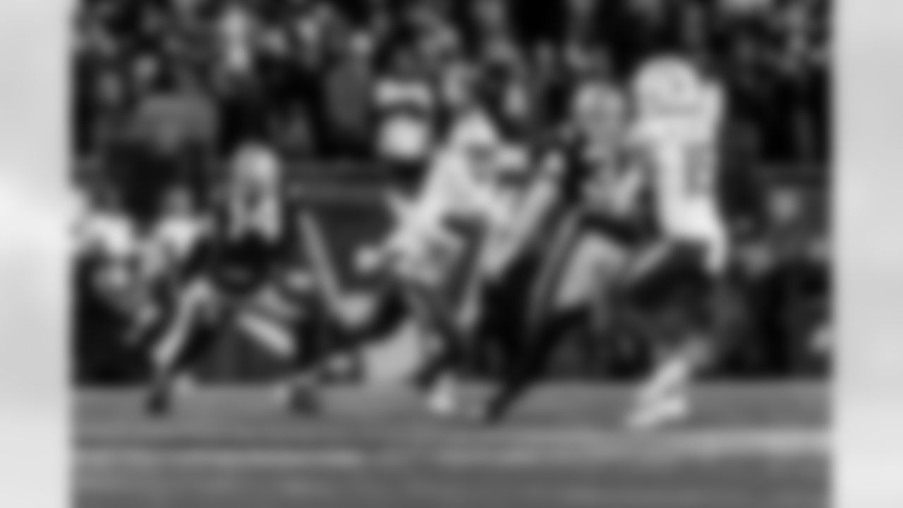 Check out the best shots from the Chargers Wild Card matchup against the Patriots!