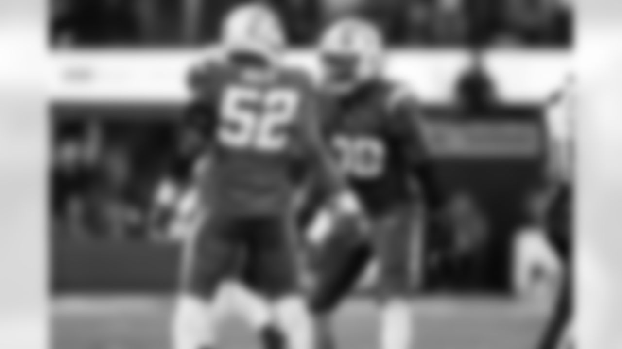 OLB Khalil Mack (52) and OLB Odafe Oweh (98)