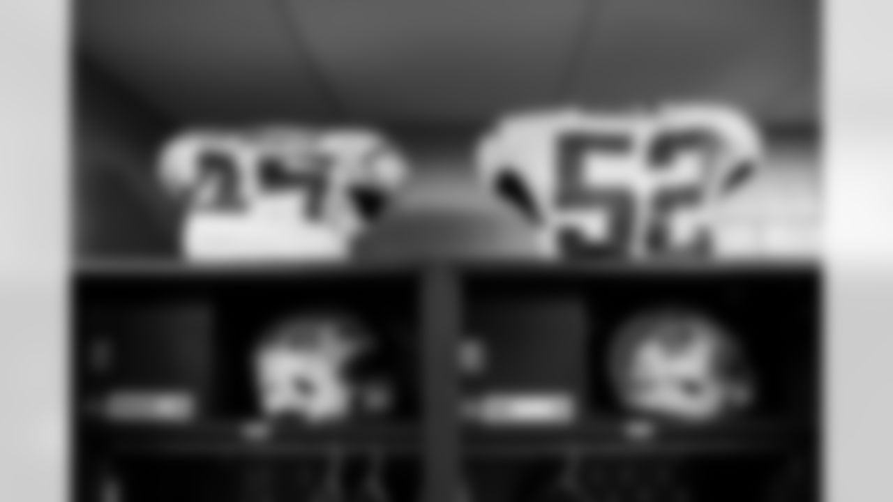 OLB Tuli Tuipulotu (45) and OLB Khalil Mack (52)