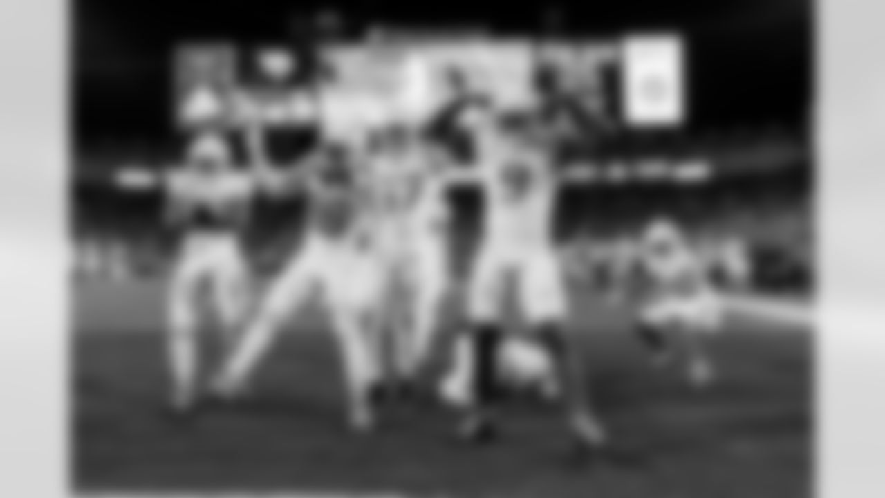 Relive the Chargers' postseason appearances through images from playoff games, highlighting the moments that defined the team in the NFL playoffs.