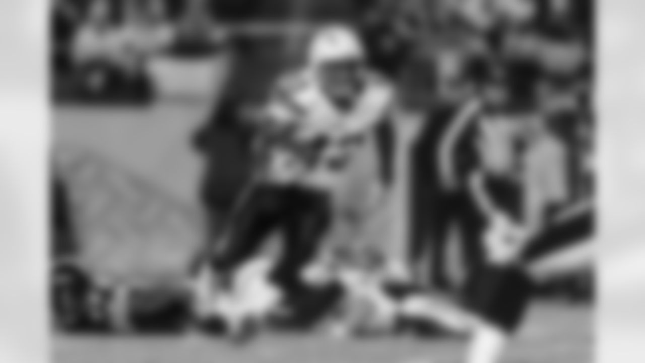 Relive the Chargers' postseason appearances through images from playoff games, highlighting the moments that defined the team in the NFL playoffs.