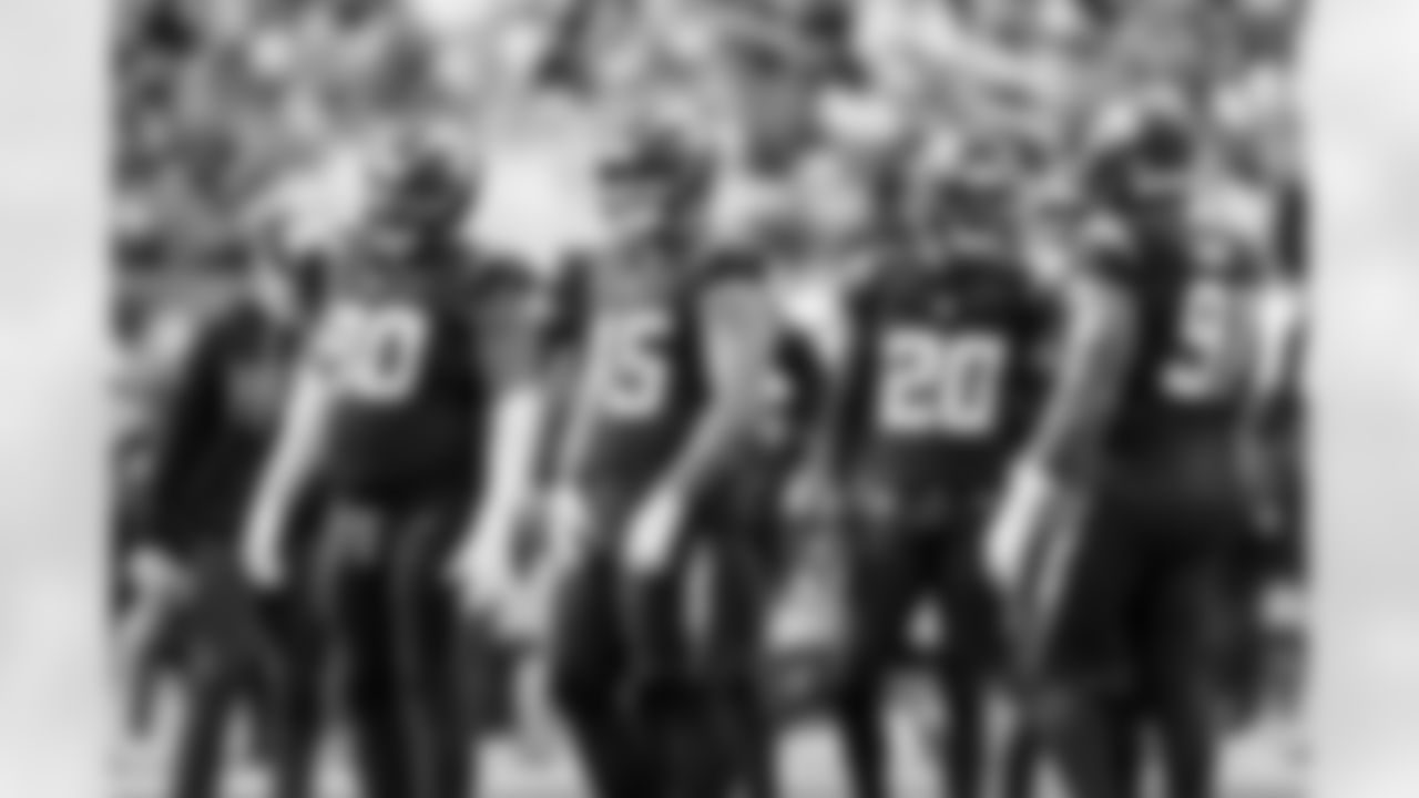 DL Teair Tart (90) and OLB Tuli Tuipulotu (45)