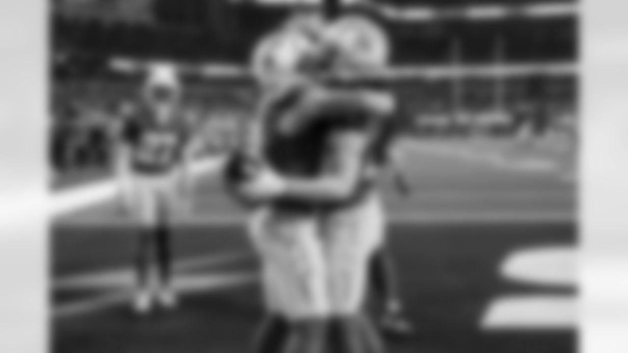 DB Elijah Molden (2) and CB Donte Jackson (26)