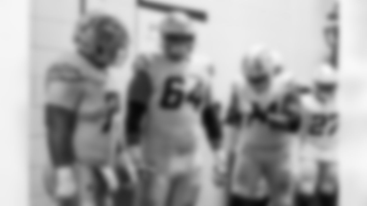 C Bradley Bozeman (75) and OL Trevor Penning (64)