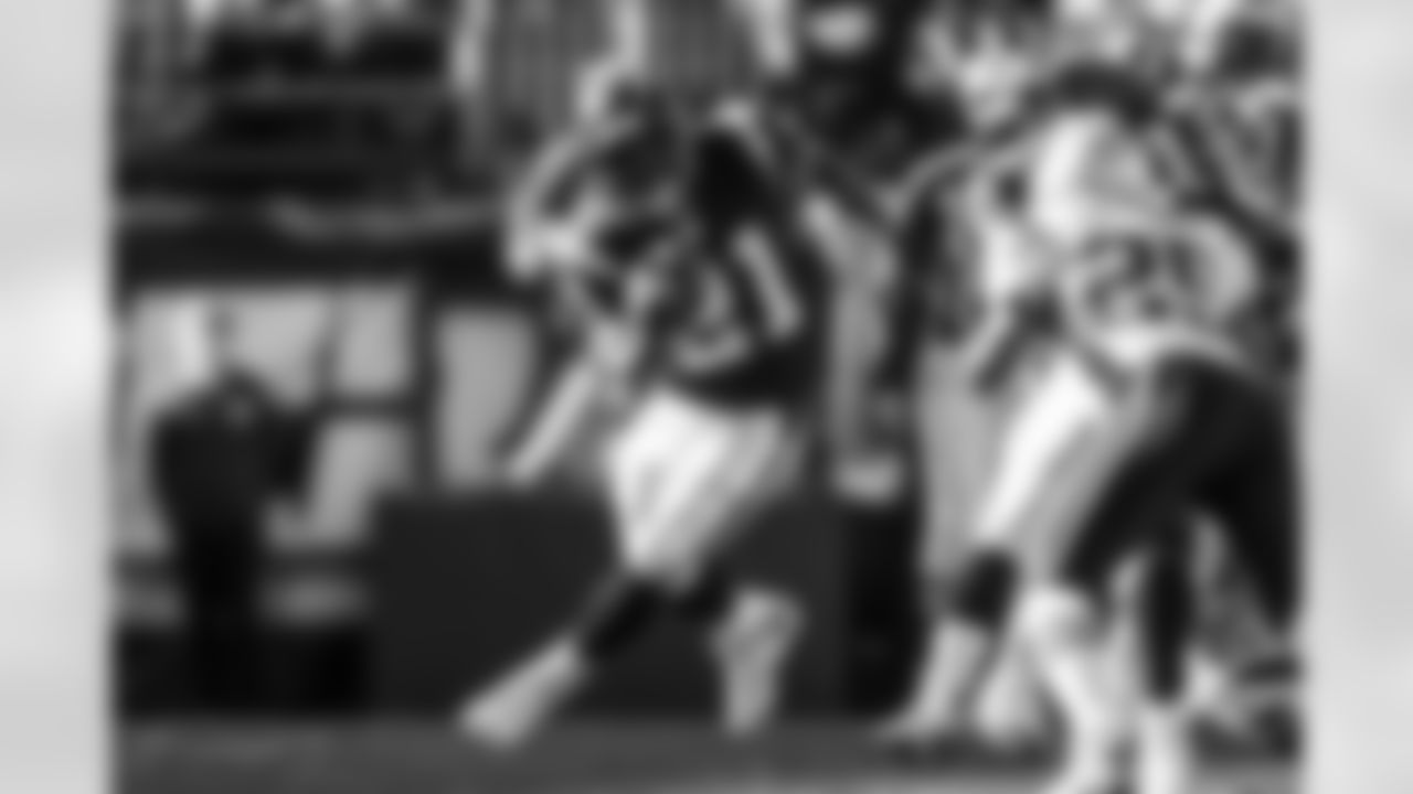 Relive the Chargers' postseason appearances through images from playoff games, highlighting the moments that defined the team in the NFL playoffs.