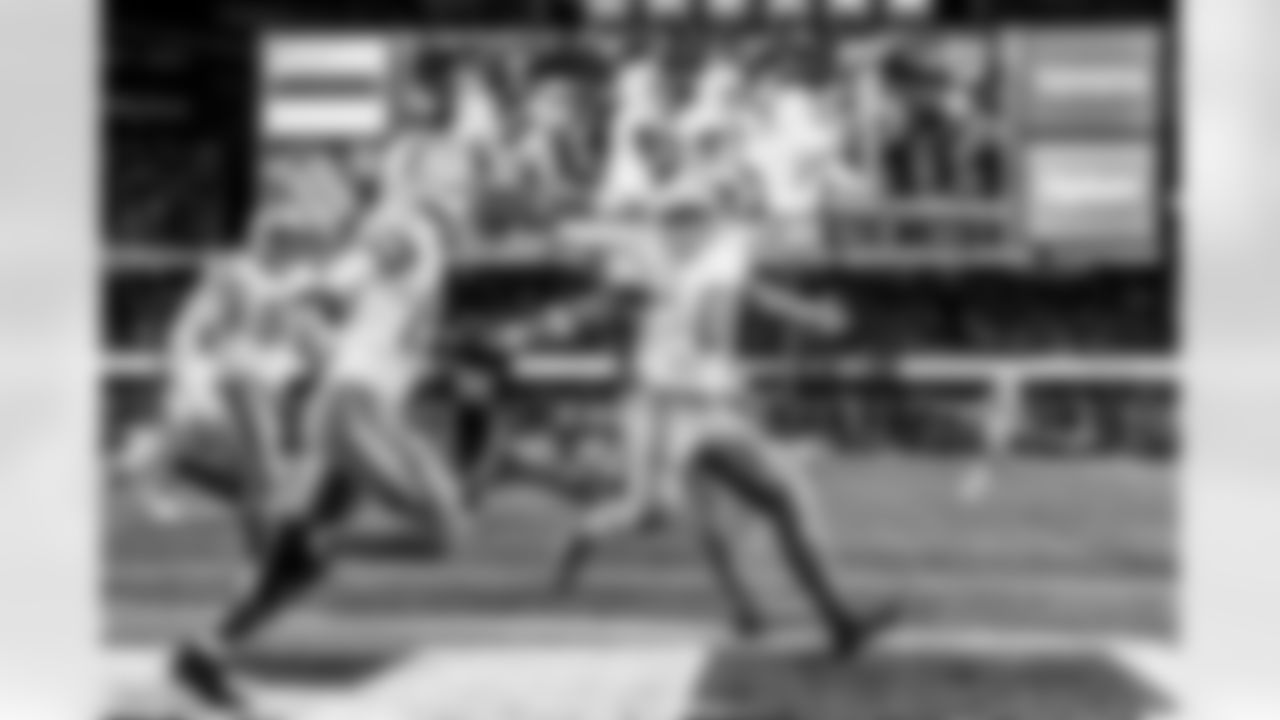 Take a look back at the Chargers Wild Card matchup with the Patriots in monochrome.