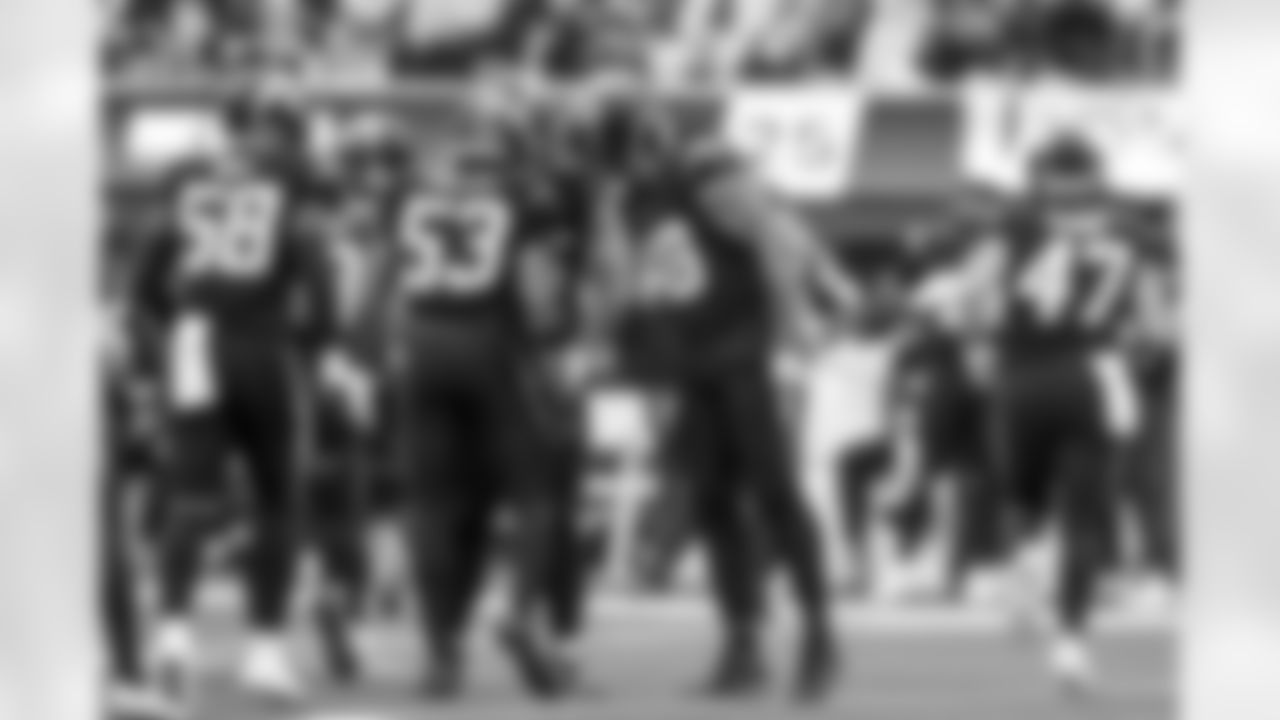 LB Del'Shawn Phillips (53) and OLB Bud Dupree (48)