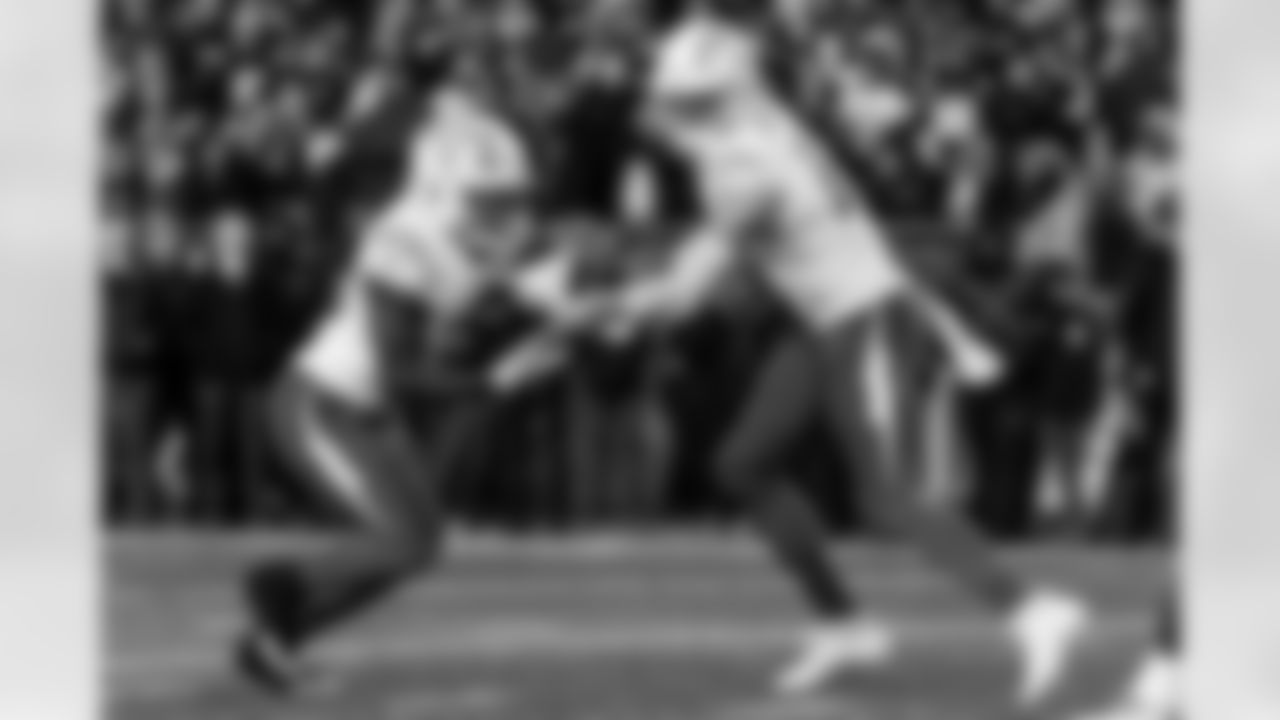 Check out the best shots from the Chargers Wild Card matchup against the Patriots!