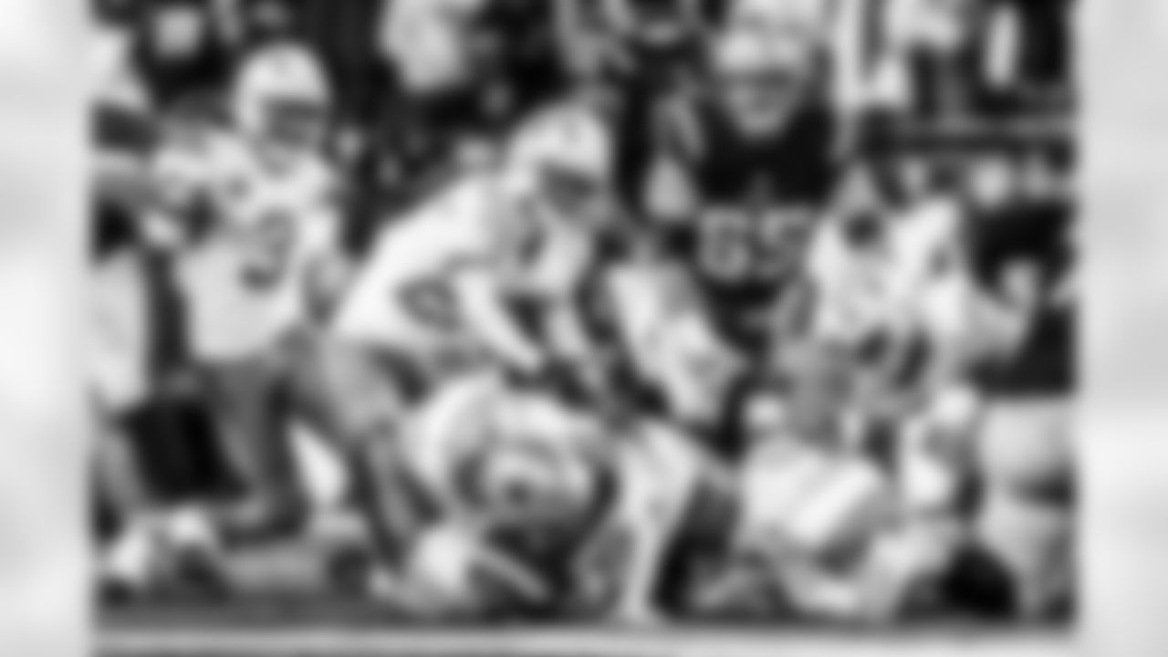 Take a look back at the Chargers Wild Card matchup with the Patriots in monochrome.