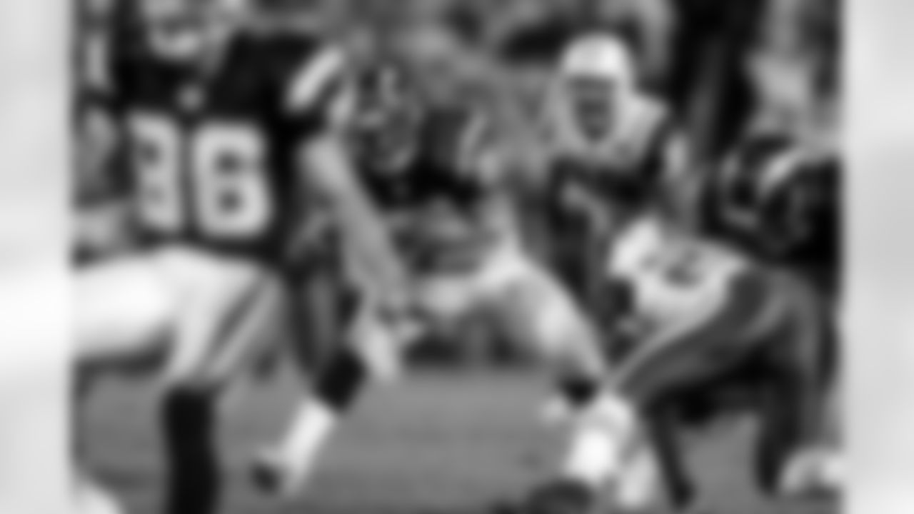 Relive the Chargers' postseason appearances through images from playoff games, highlighting the moments that defined the team in the NFL playoffs.