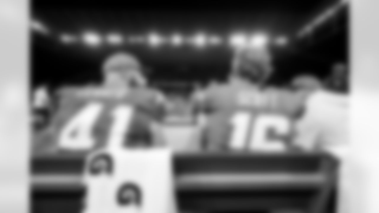 LS Rick Lovato (41) and P JK Scott (16)