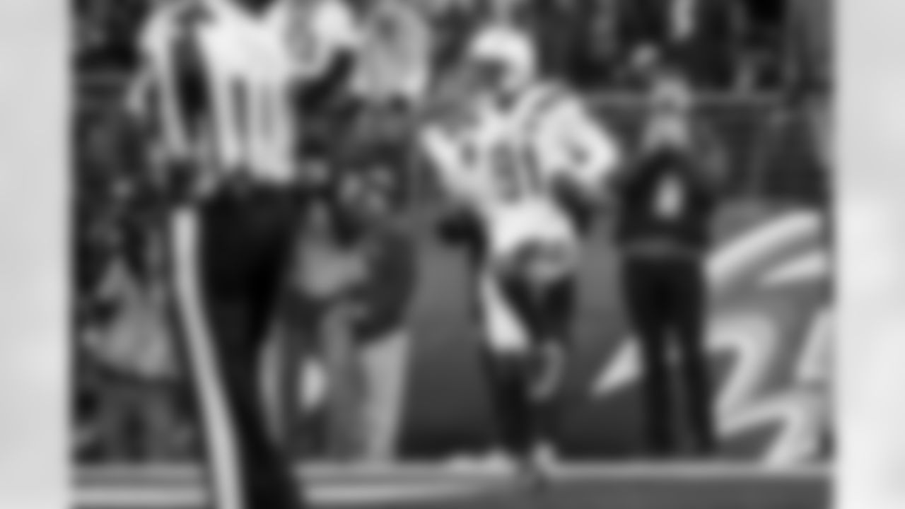 Relive the Chargers' postseason appearances through images from playoff games, highlighting the moments that defined the team in the NFL playoffs.