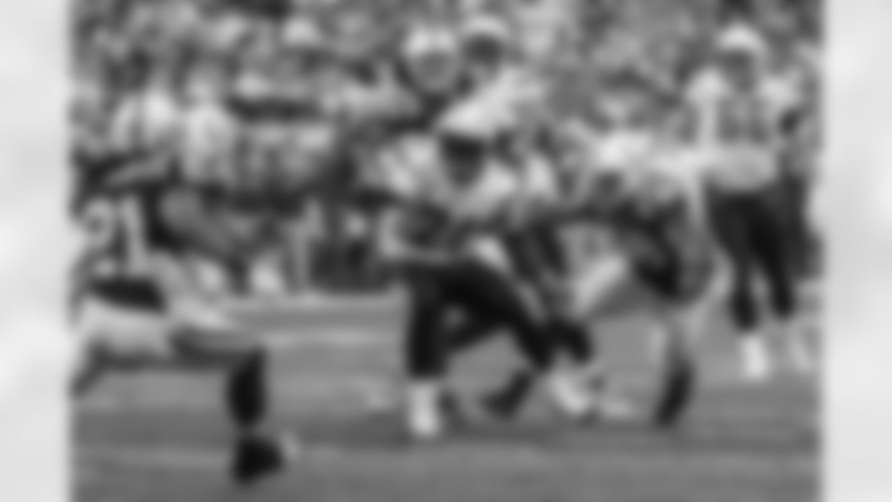 Relive the Chargers' postseason appearances through images from playoff games, highlighting the moments that defined the team in the NFL playoffs.