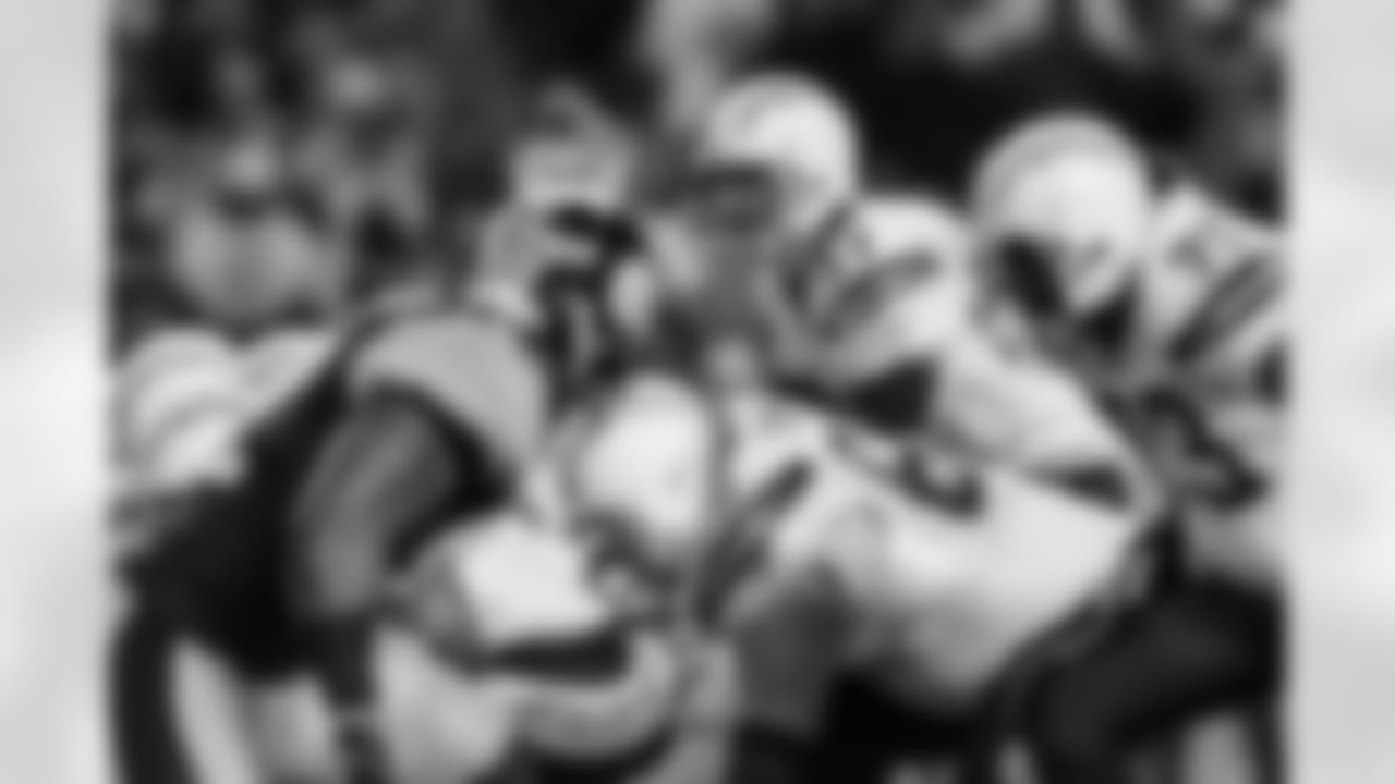 Relive the Chargers' postseason appearances through images from playoff games, highlighting the moments that defined the team in the NFL playoffs.