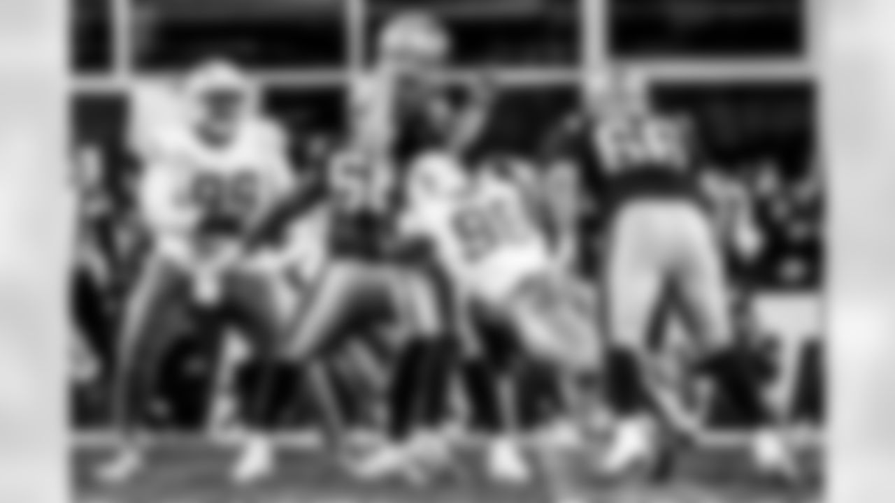 Take a look back at the Chargers Wild Card matchup with the Patriots in monochrome.