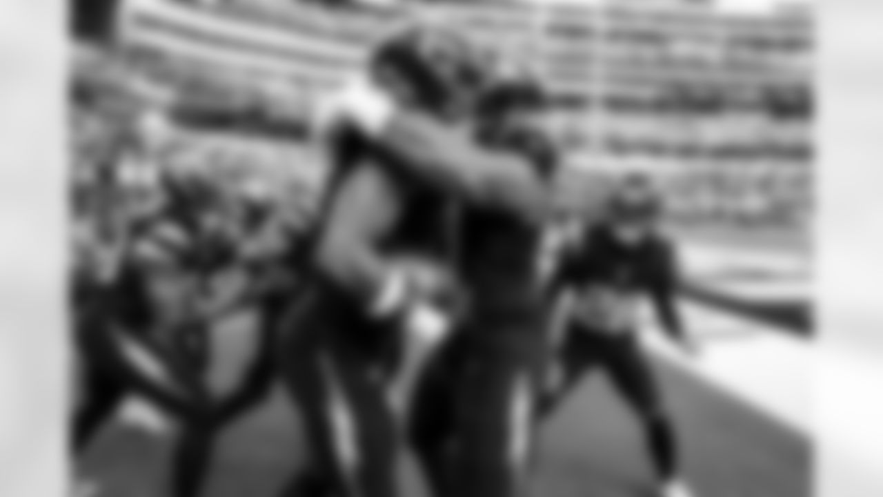 S Derwin James Jr. (3) and DL Da'Shawn Hand (91)