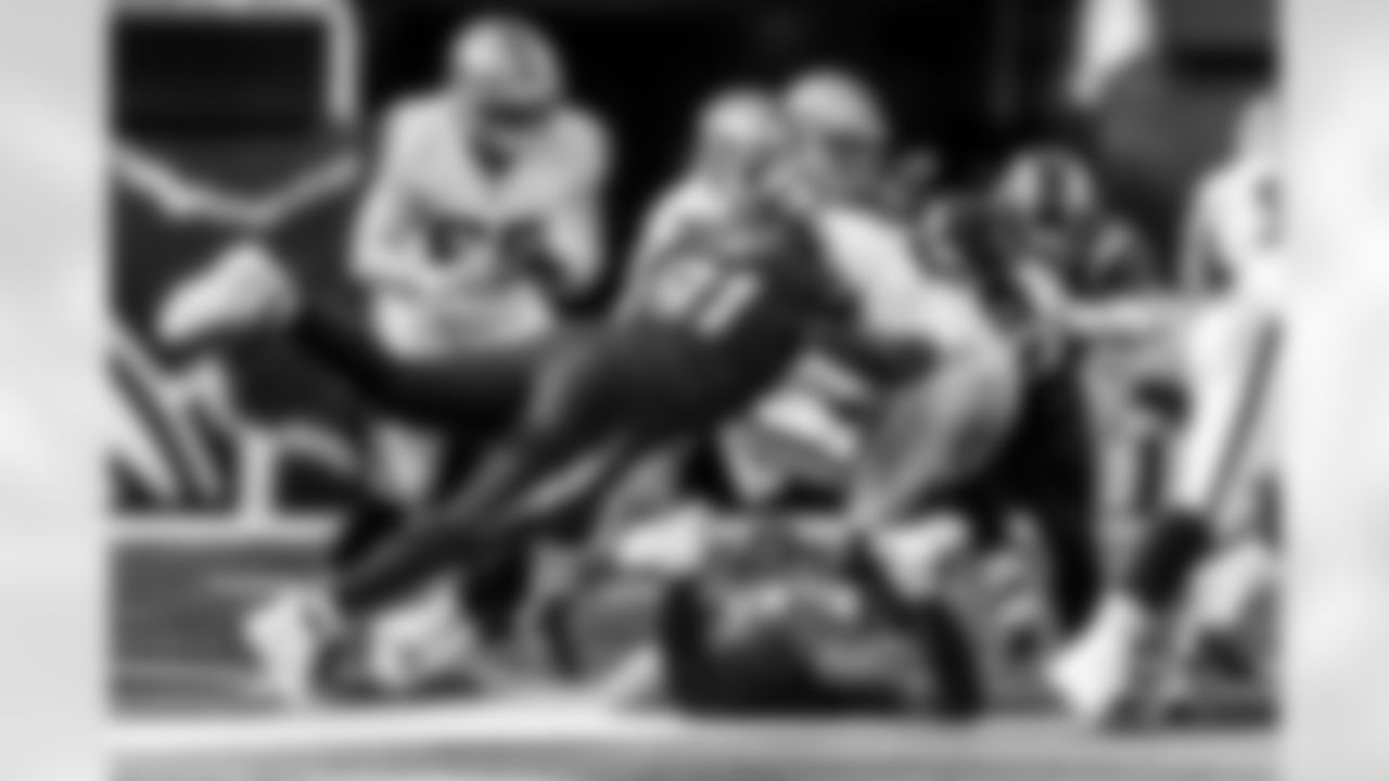 Take a look back at the Chargers Week 13 matchup with the Raiders in monochrome.