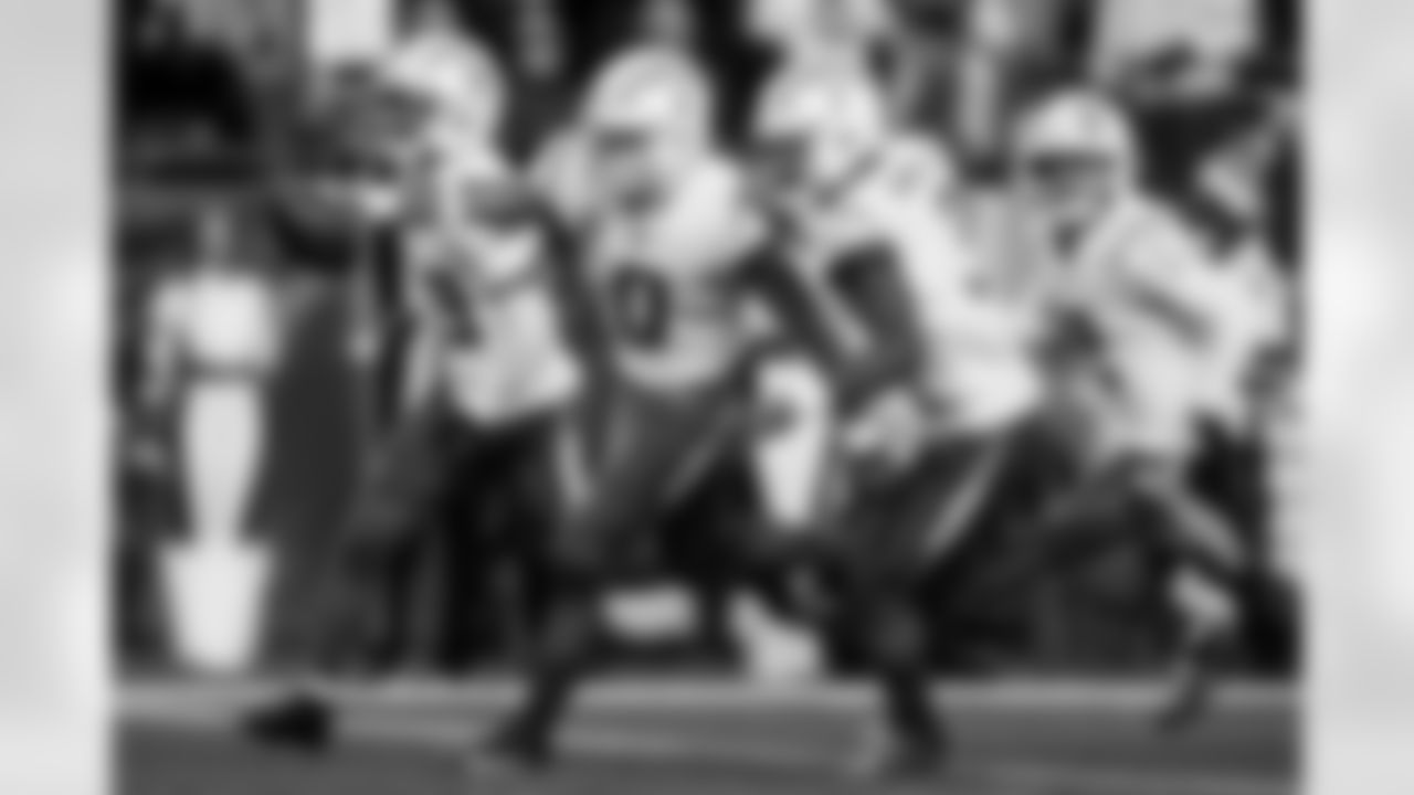 Check out the best shots from the Chargers Wild Card matchup against the Patriots!