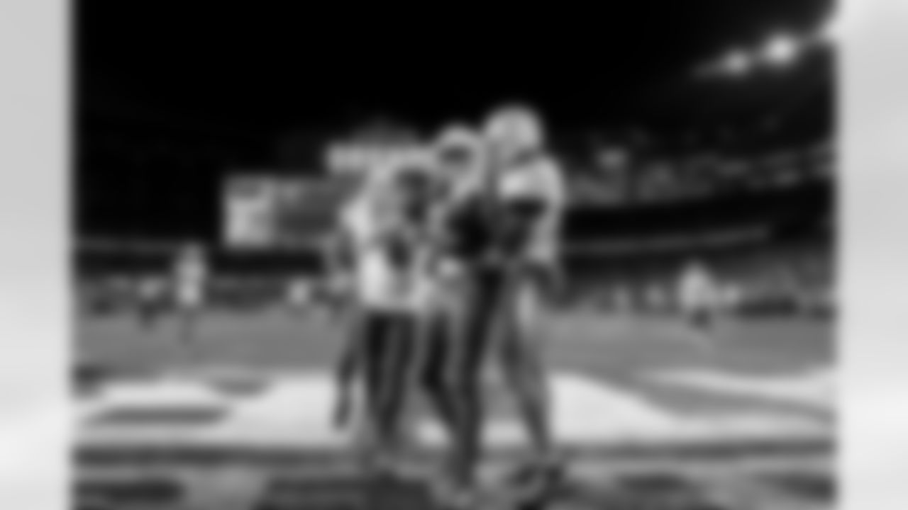 DB Elijah Molden (2), LB Del'Shawn Phillips (53) and LB Daiyan Henley (0)