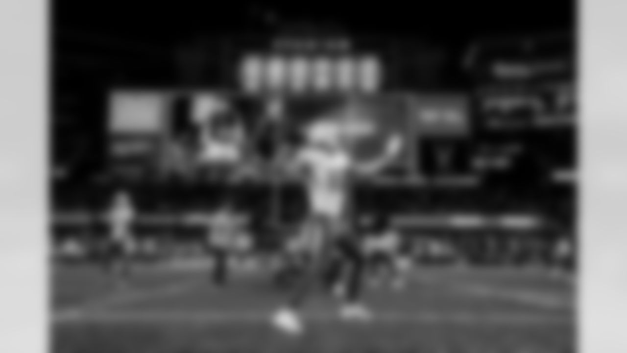 Check out the best shots from the Chargers Wild Card matchup against the Patriots!