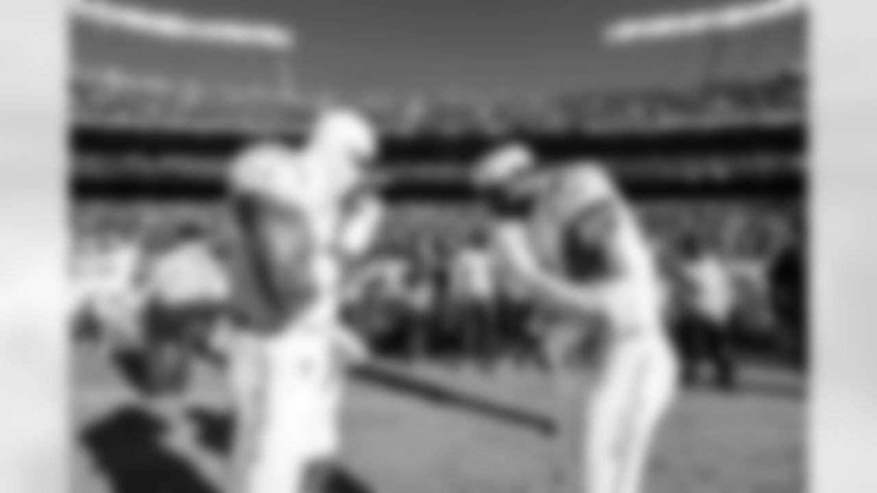 S Derwin James Jr. (3) and LB Daiyan Henley (0)