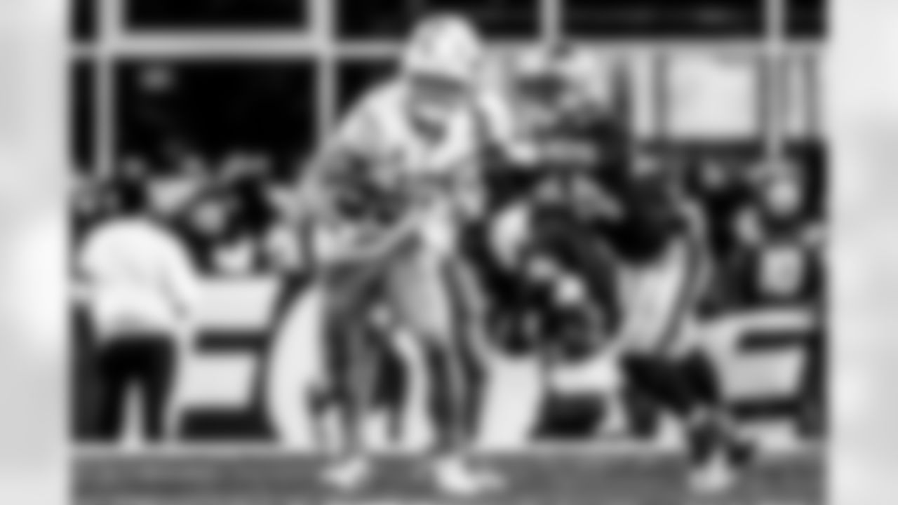 Take a look back at the Chargers Wild Card matchup with the Patriots in monochrome.