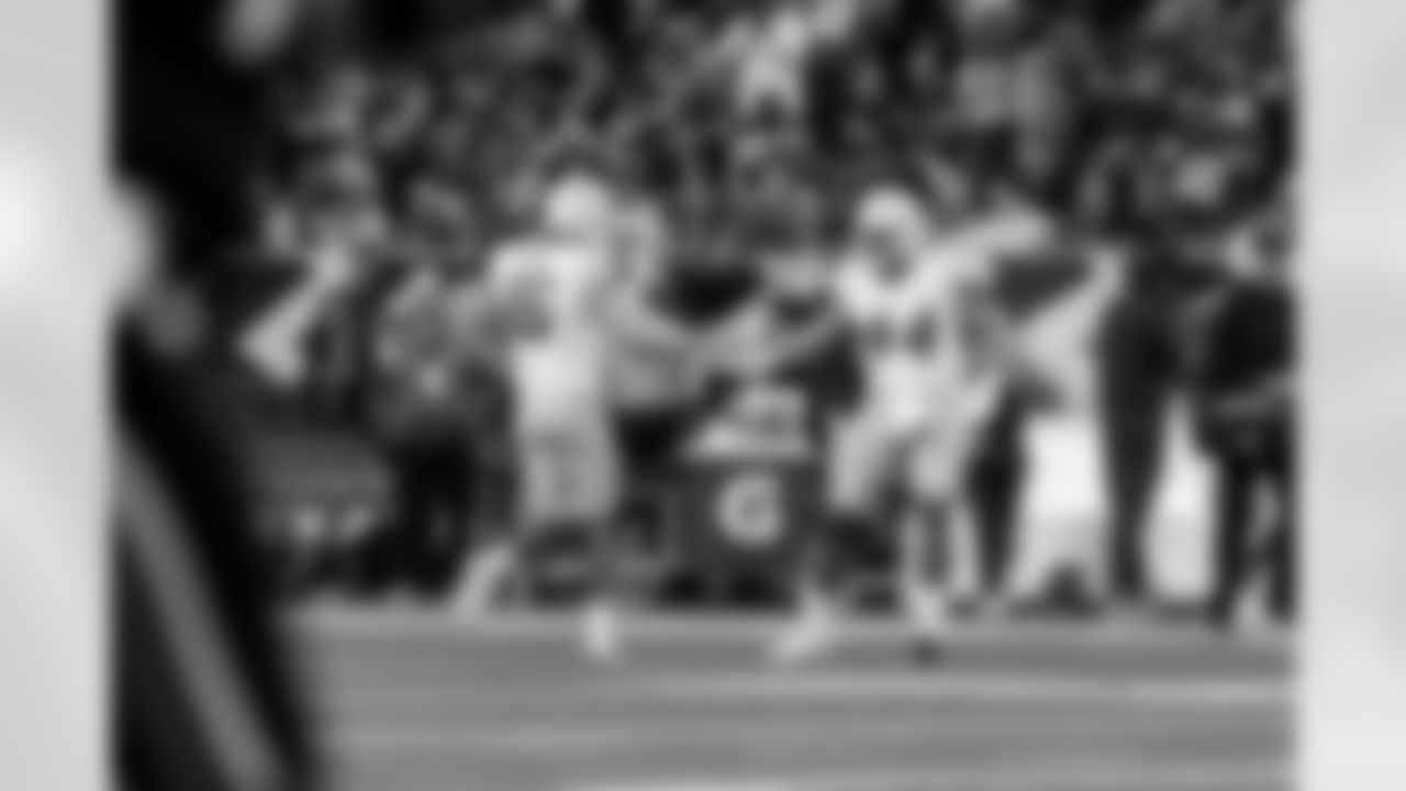 Check out the best shots from the Chargers Wild Card matchup against the Texans!