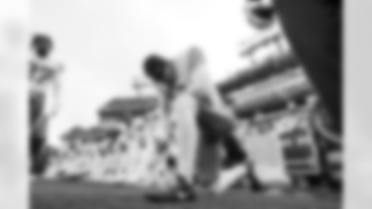 S RJ Mickens (27) and QB Trey Lance (5)