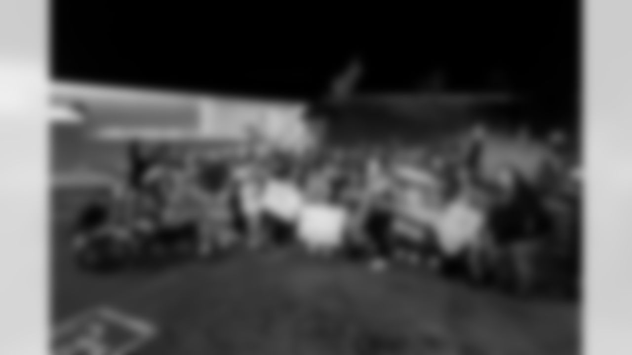 Los Angeles Chargers fans gather on Saturday, December 28, 2024 at The Bolt in El Segundo, CA to welcome the team home after their win over play the New England Patriots.
