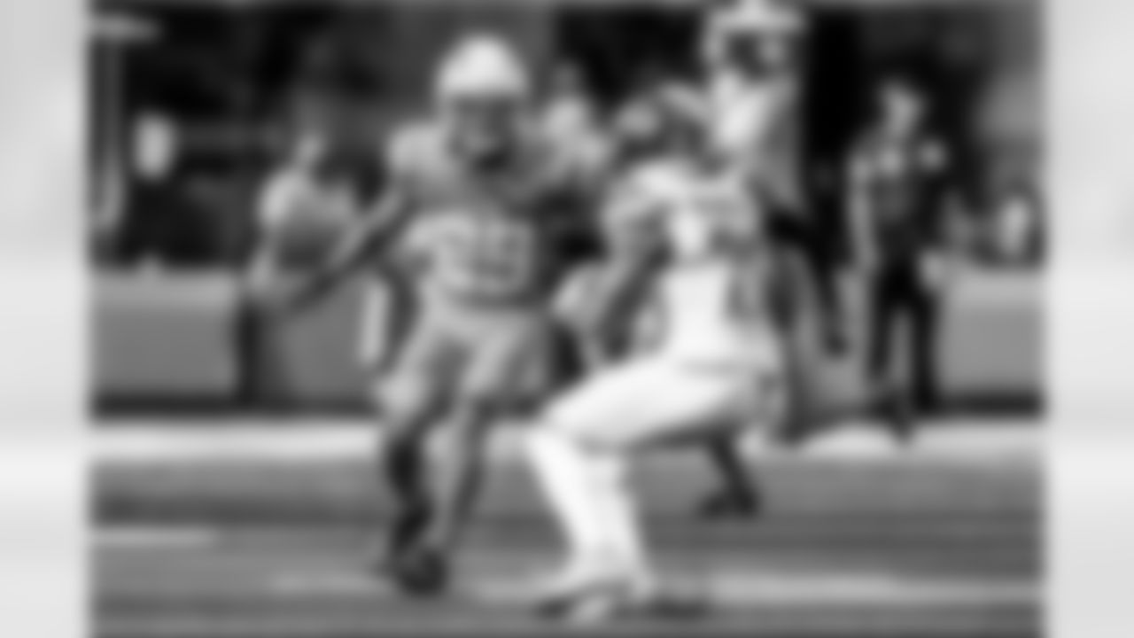 Take a look back at the Chargers Week 5 matchup with the Commanders in monochrome!