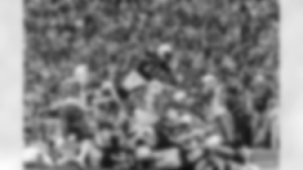 Relive the Chargers' postseason appearances through images from playoff games, highlighting the moments that defined the team in the NFL playoffs.