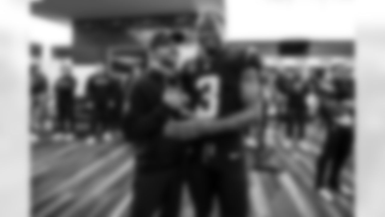 Defensive Coordinator Jesse Minter and S Derwin James Jr. (3)