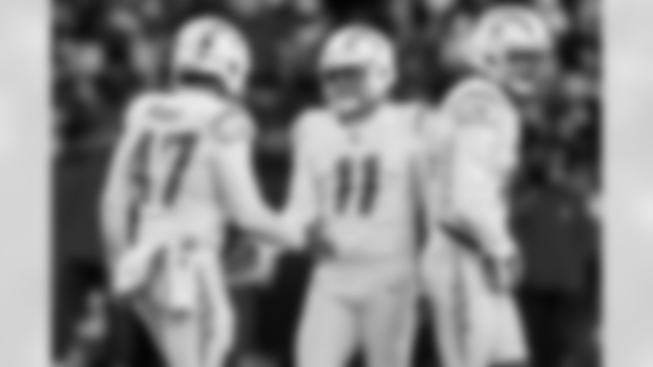 LS Josh Harris (47) and K Cameron Dicker (11)