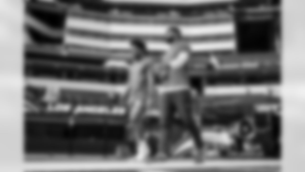 TE Oronde Gadsden (86) and QB DJ Uiagalelei (7)