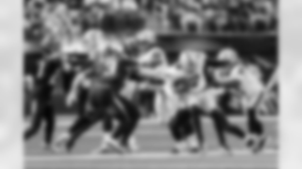 S Derwin James Jr. (3) and LB Daiyan Henley (0)