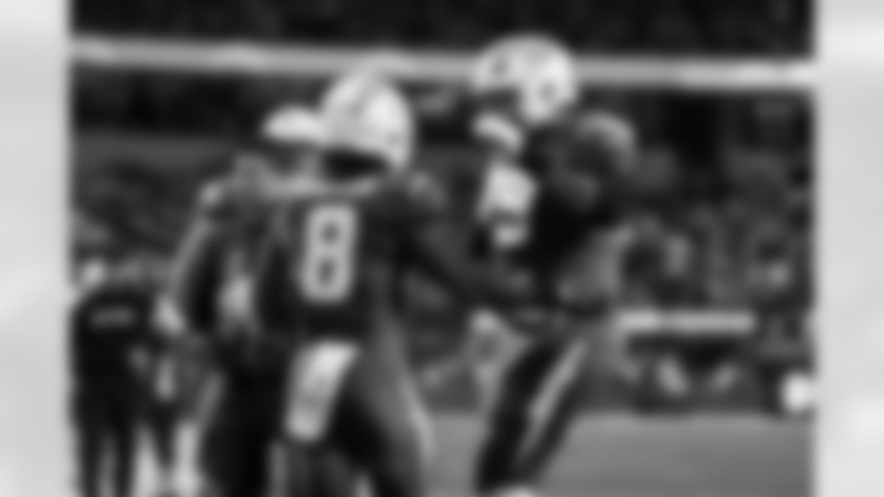 RB Omarion Hampton (8) and T Trey Pipkins III (79)