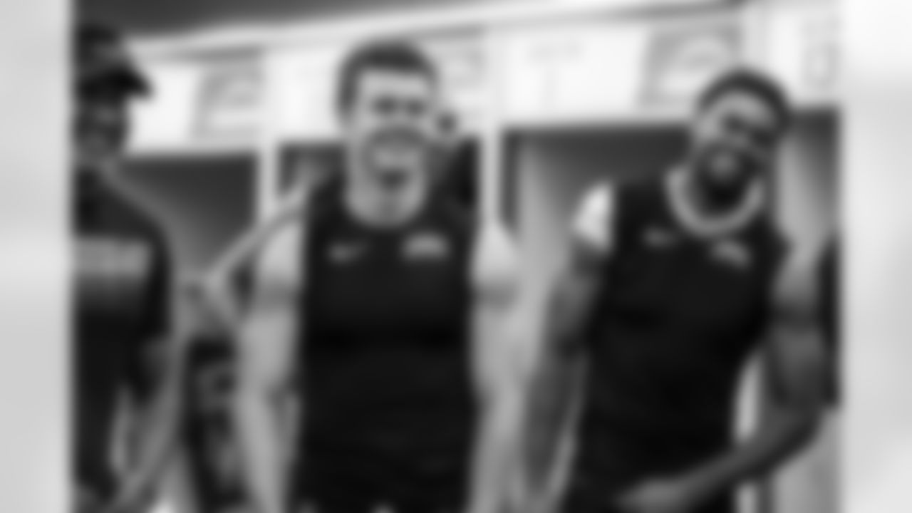 Wide Receivers Coach Sanjay Lal, WR Ladd McConkey (15) and WR Tre Harris (9)