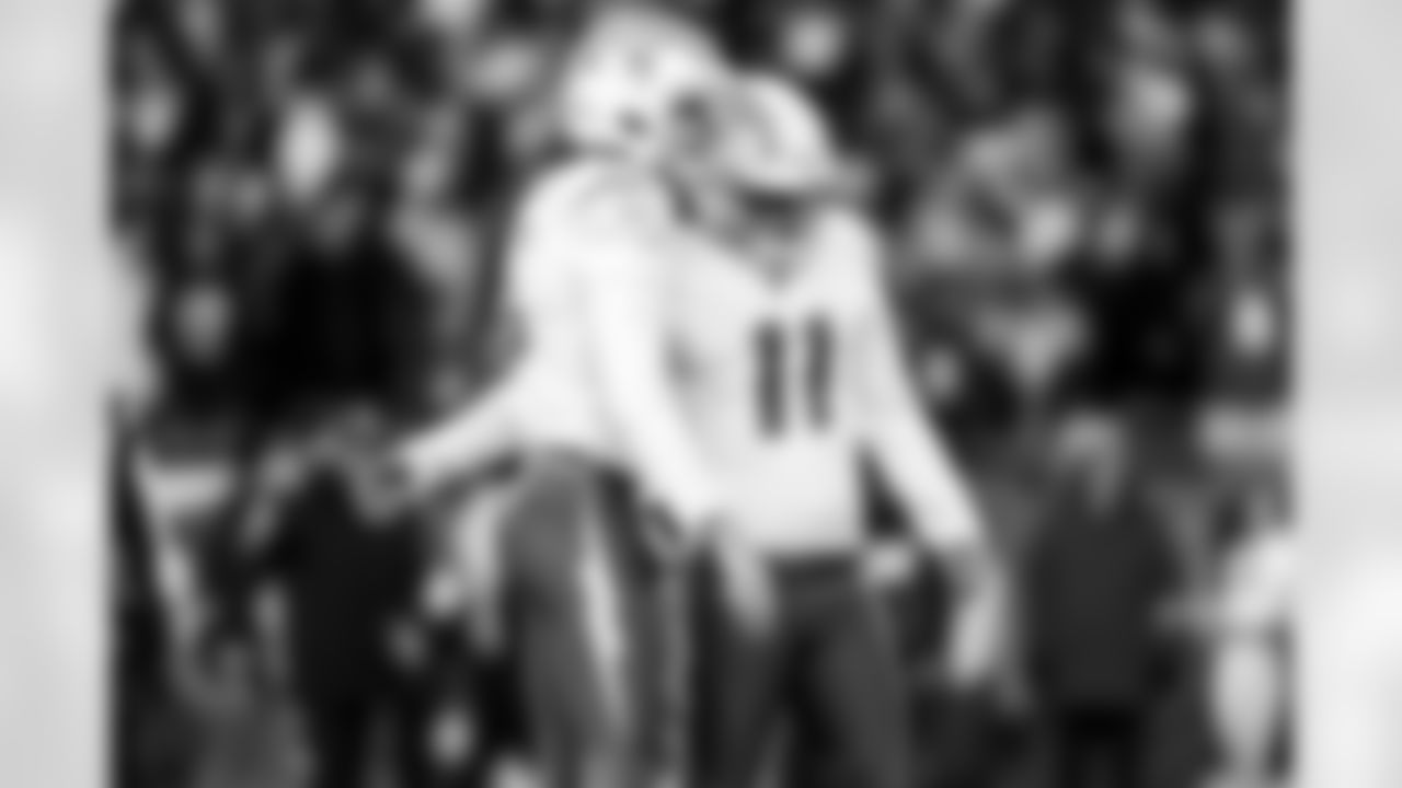 P JK Scott (16) and K Cameron Dicker (11)