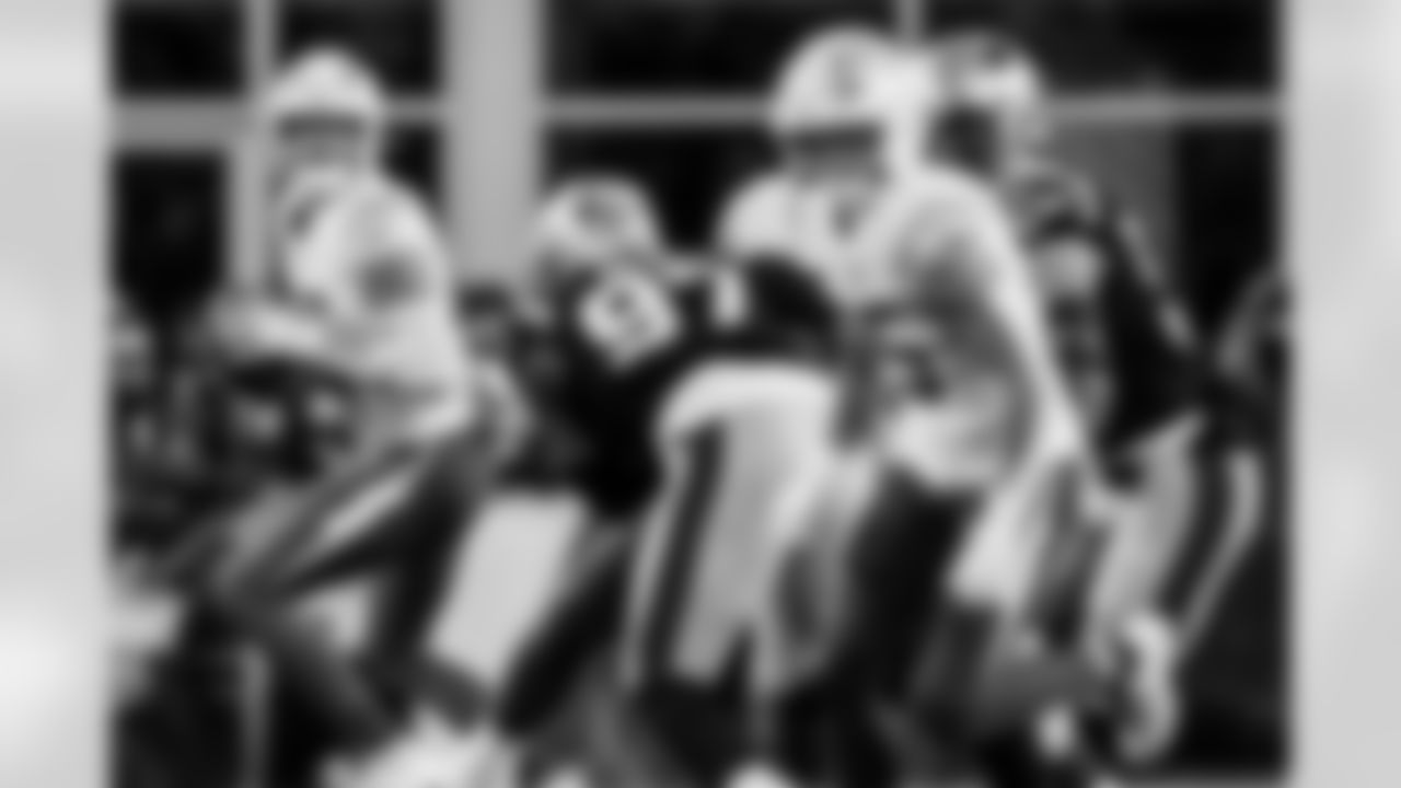 Check out the best shots from the Chargers Wild Card matchup against the Patriots!