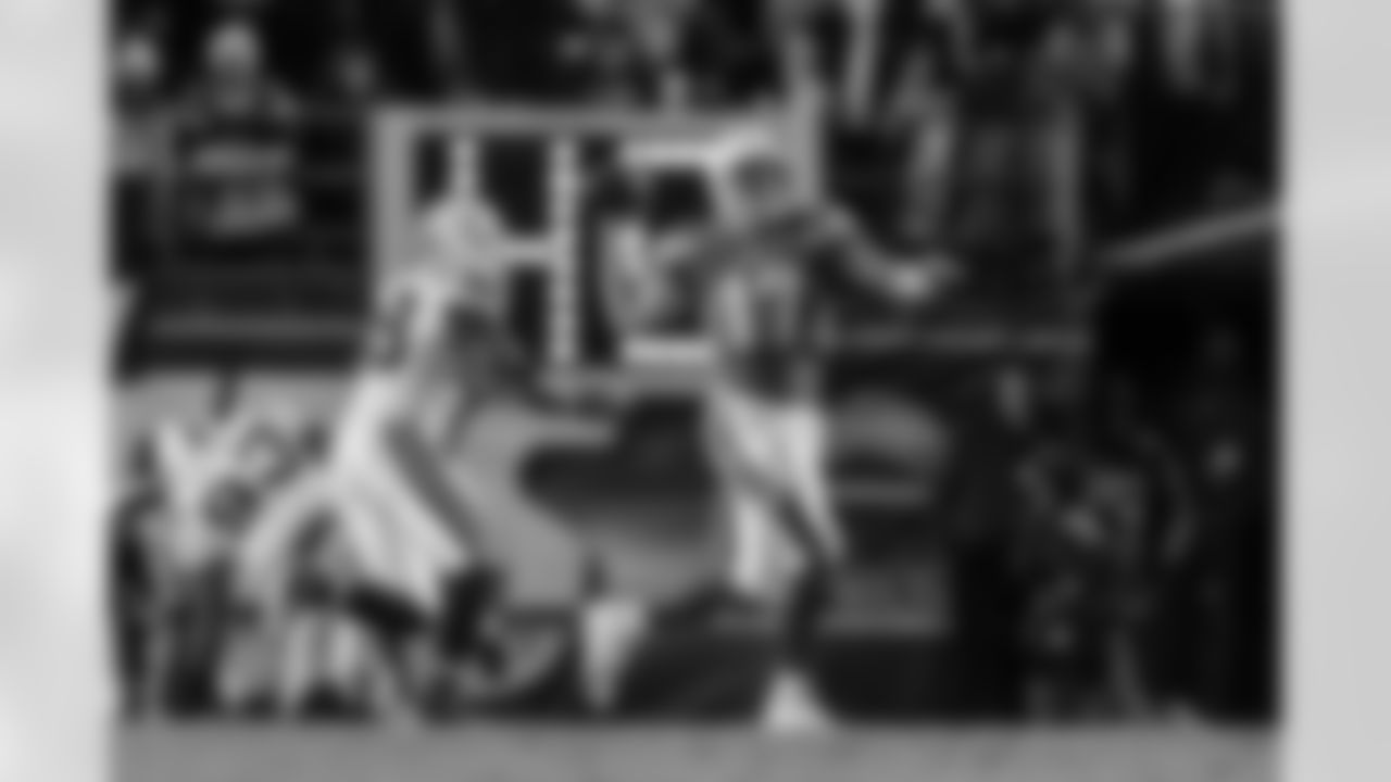 Relive the Chargers' postseason appearances through images from playoff games, highlighting the moments that defined the team in the NFL playoffs.