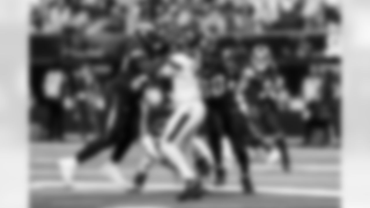 DL Justin Eboigbe (92) and OLB Odafe Oweh (98)