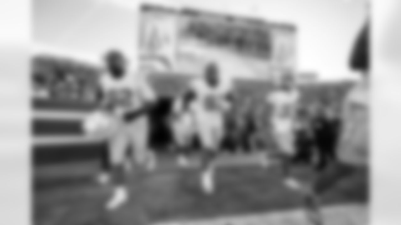 DL Justin Eboigbe (92), DL Da'Shawn Hand (91) and DB Deane Leonard (33)