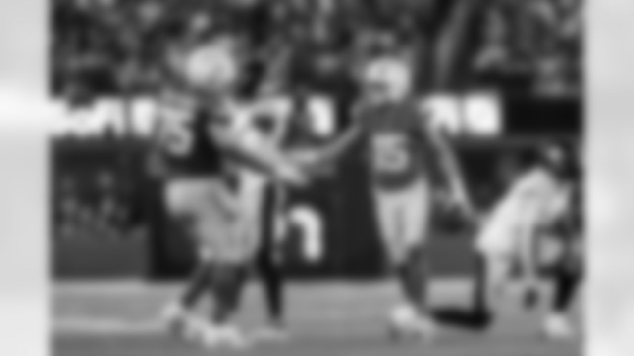 C Bradley Bozeman (75) and WR Ladd McConkey (15)