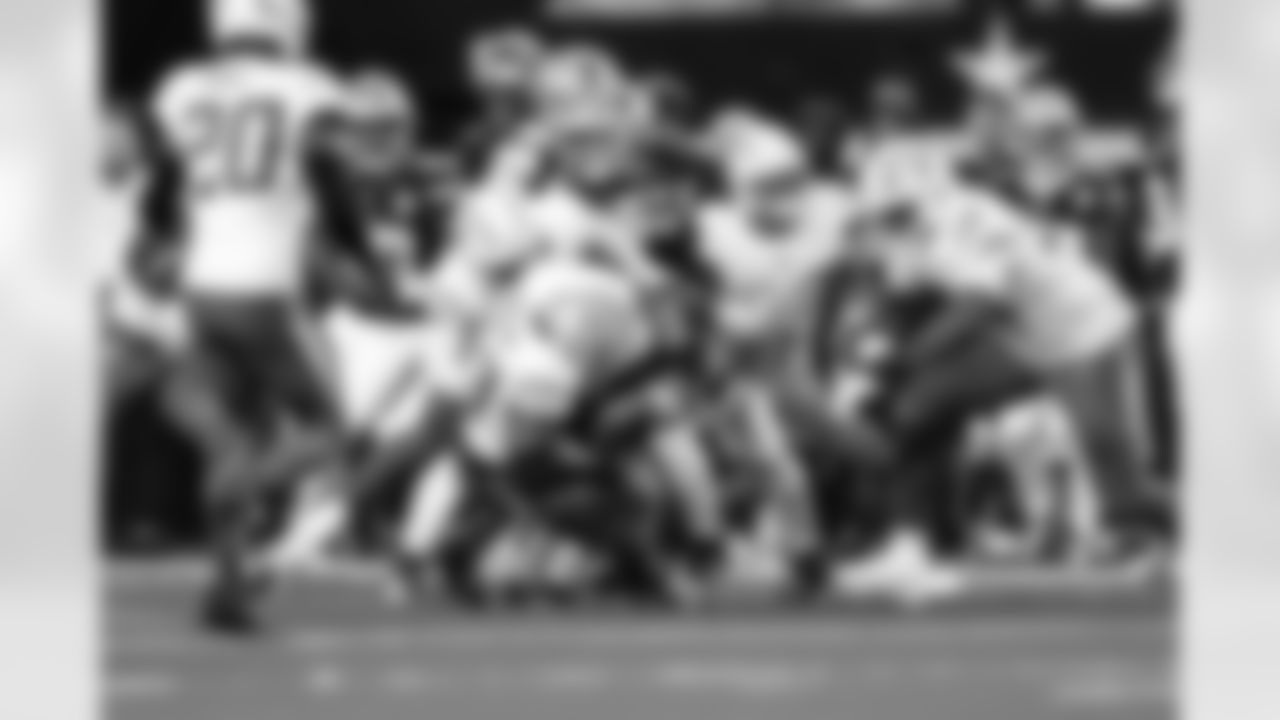 LB Marlowe Wax (58), LB Del'Shawn Phillips (53) and DL Justin Eboigbe (92)