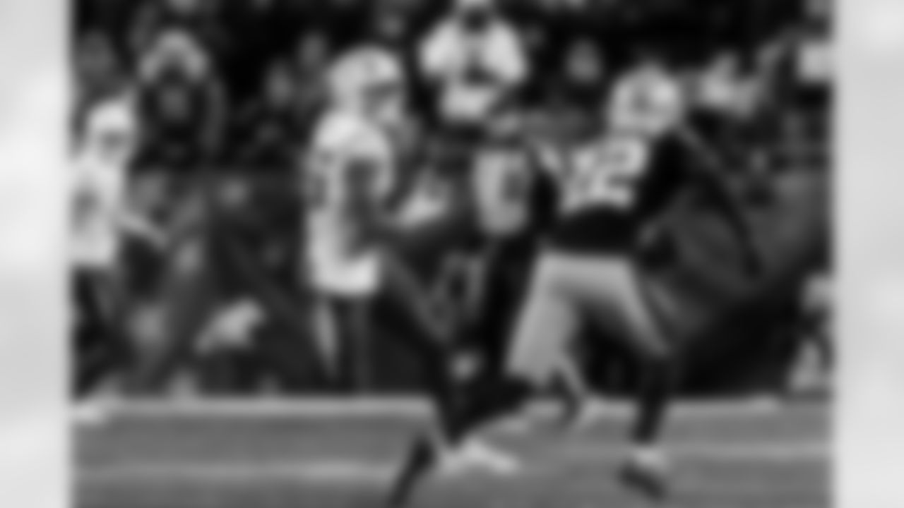 Check out the best shots from the Chargers Wild Card matchup against the Patriots!