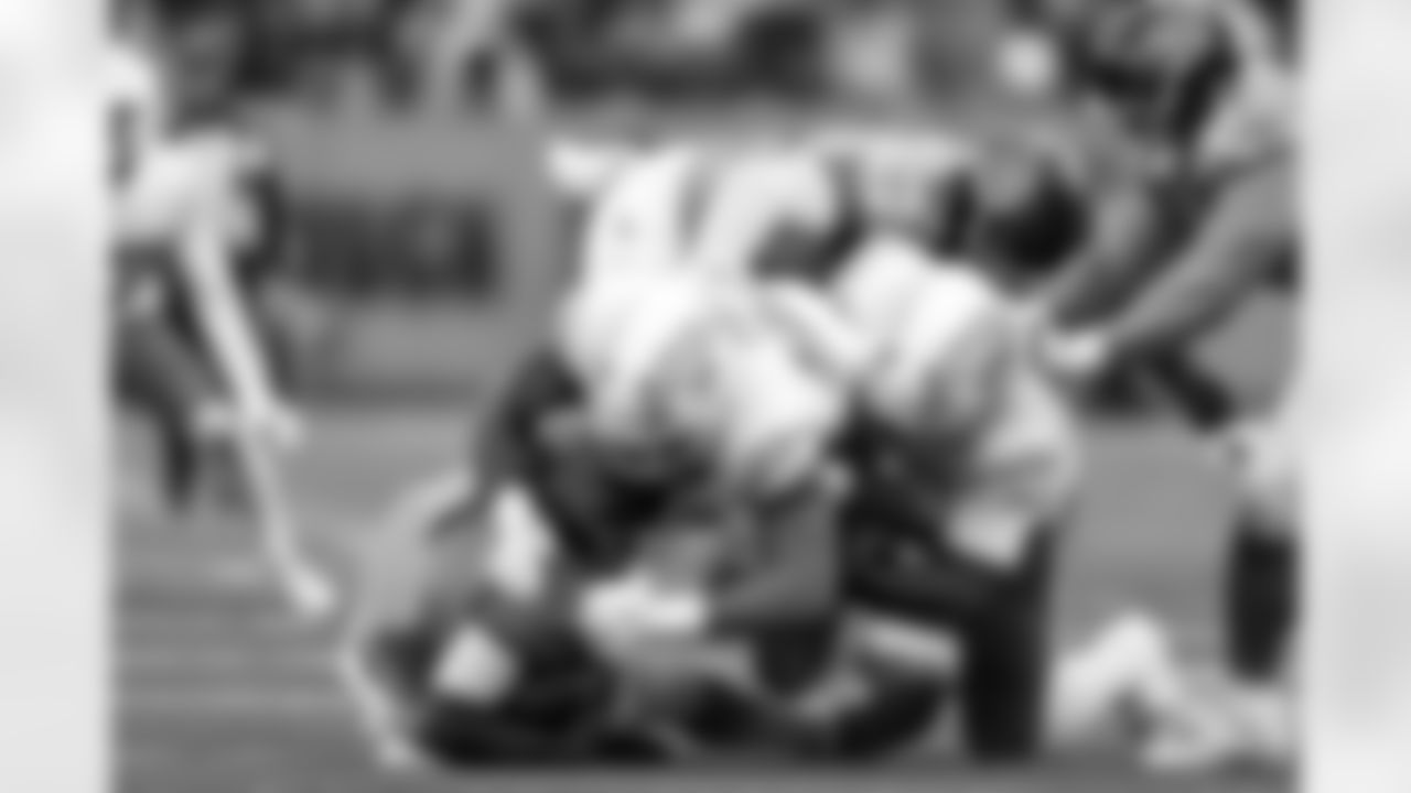 OLB Odafe Oweh (98) and DL Justin Eboigbe (92)